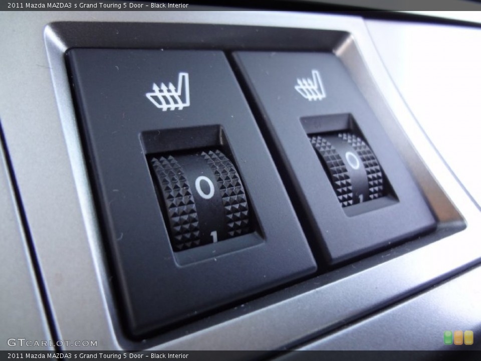 Black Interior Controls for the 2011 Mazda MAZDA3 s Grand Touring 5 Door #70068075
