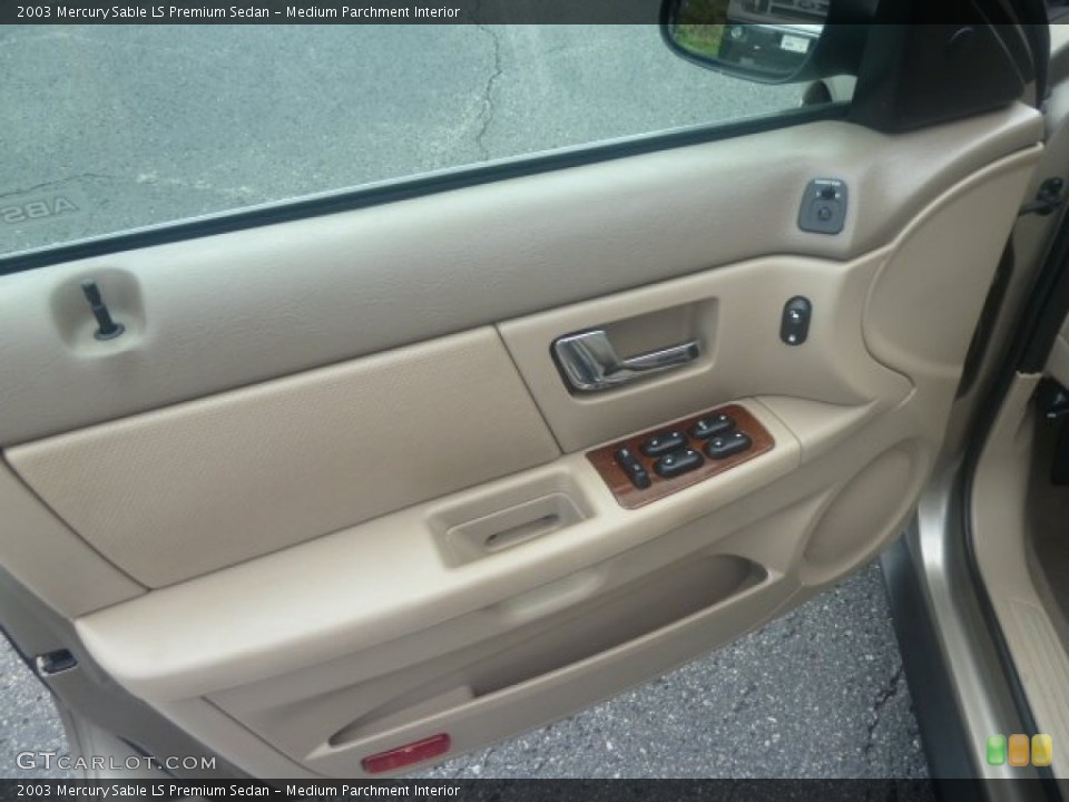 Medium Parchment Interior Door Panel for the 2003 Mercury Sable LS Premium Sedan #70077170