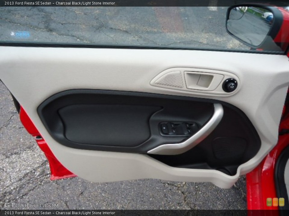 Charcoal Black/Light Stone Interior Door Panel for the 2013 Ford Fiesta SE Sedan #70096773