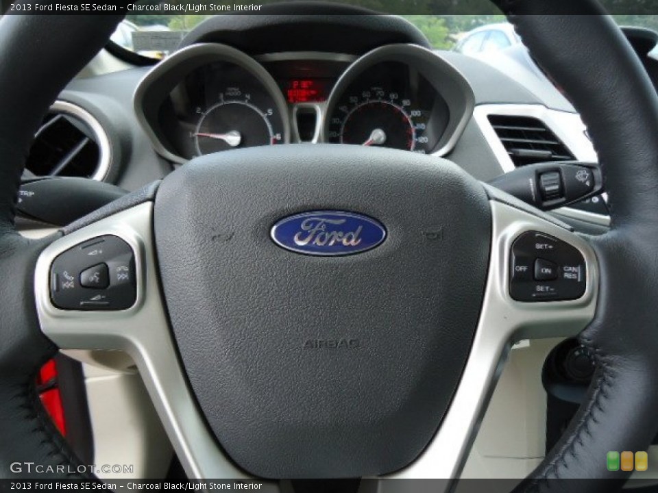 Charcoal Black/Light Stone Interior Controls for the 2013 Ford Fiesta SE Sedan #70096791