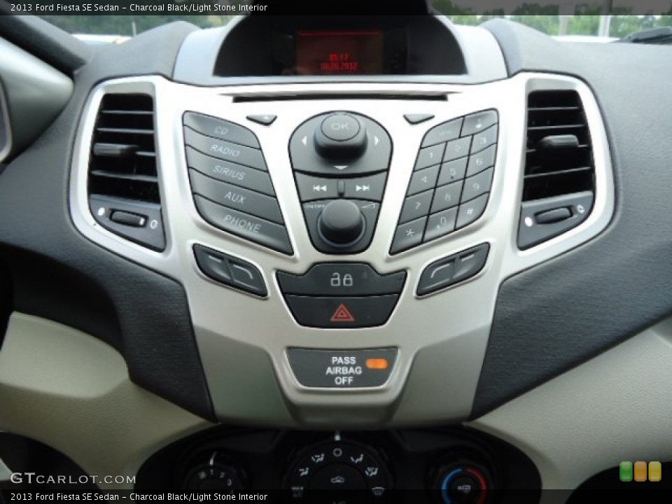 Charcoal Black/Light Stone Interior Controls for the 2013 Ford Fiesta SE Sedan #70096800