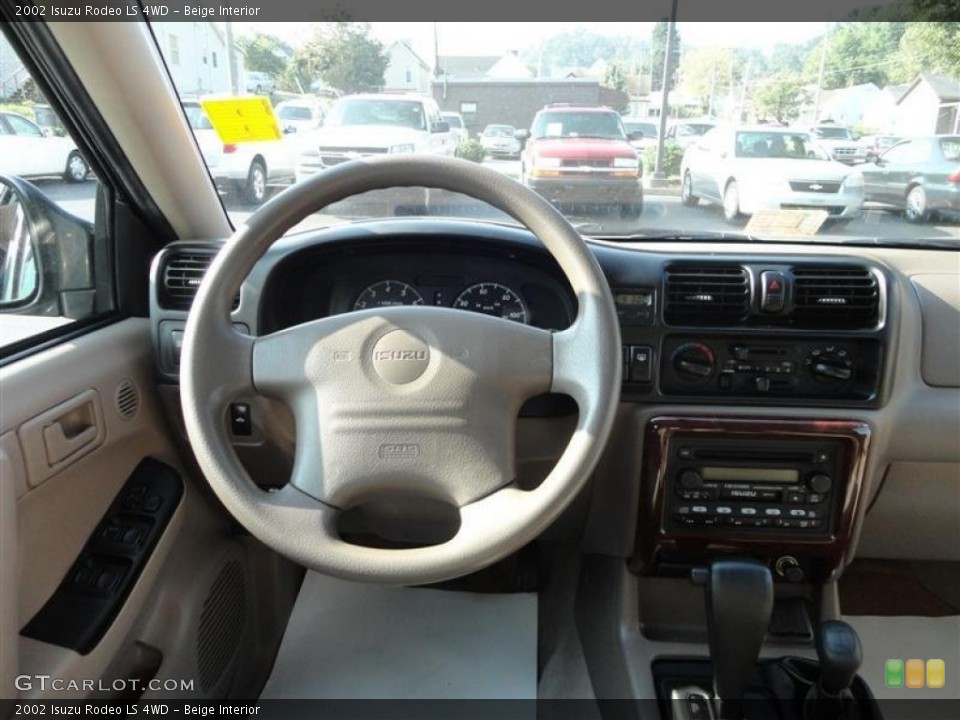 Beige Interior Dashboard for the 2002 Isuzu Rodeo LS 4WD #70101480