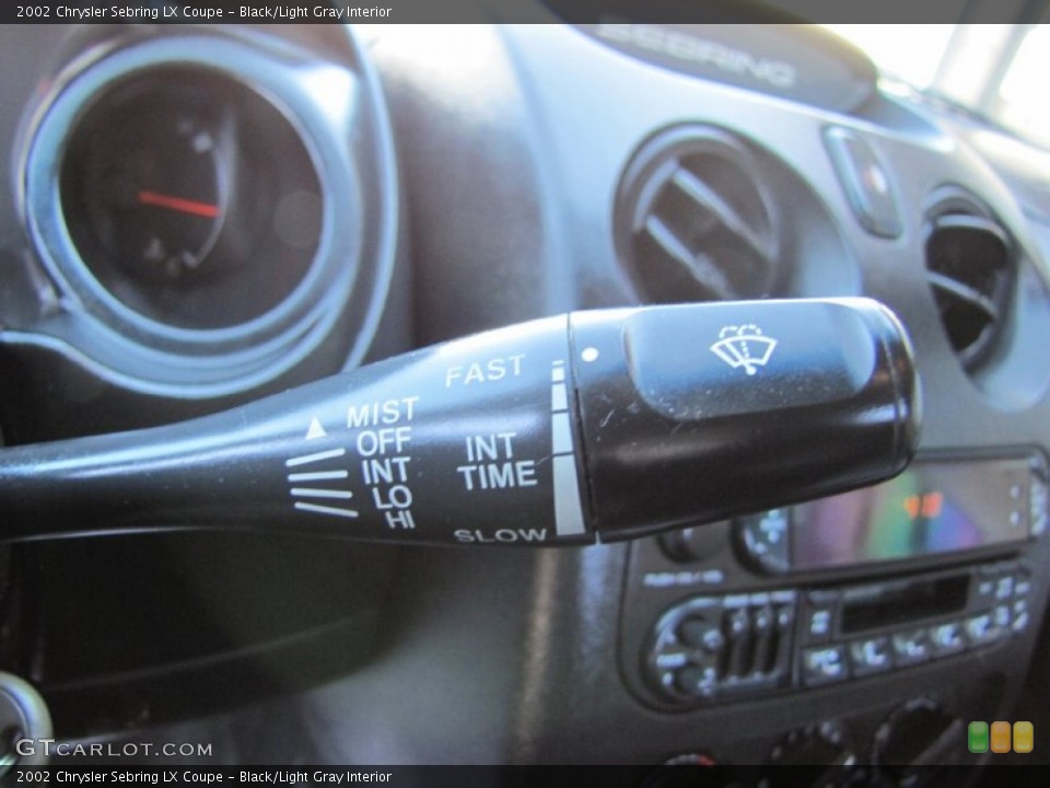 Black/Light Gray Interior Controls for the 2002 Chrysler Sebring LX Coupe #70130675