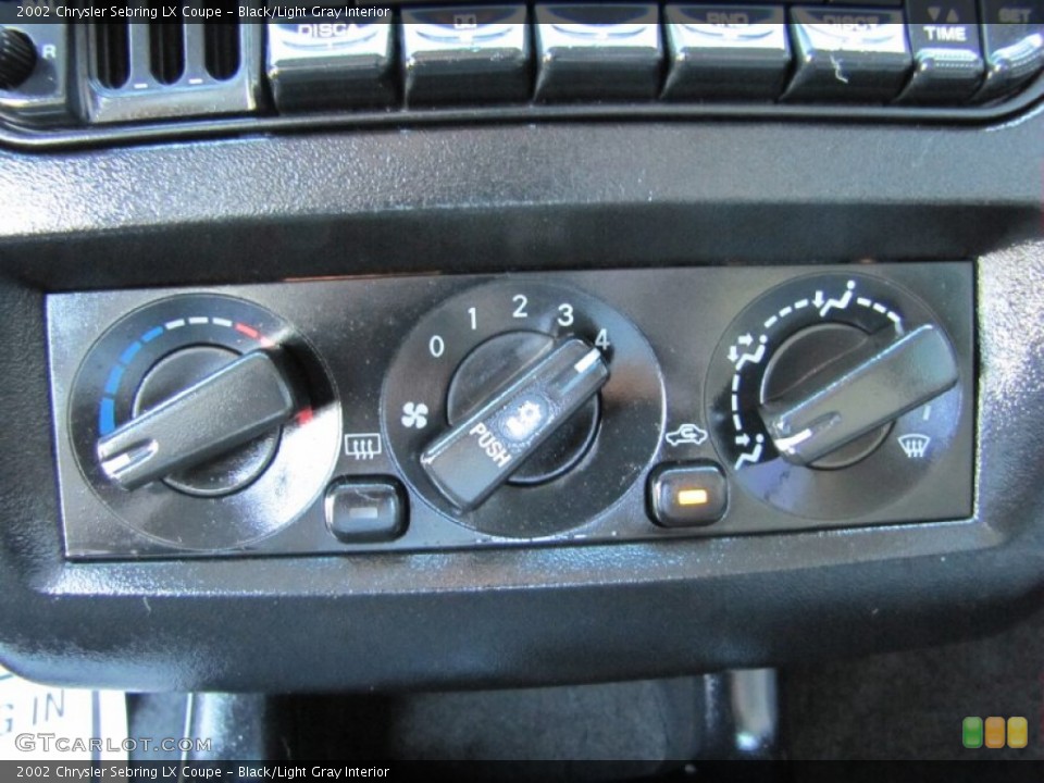 Black/Light Gray Interior Controls for the 2002 Chrysler Sebring LX Coupe #70130684
