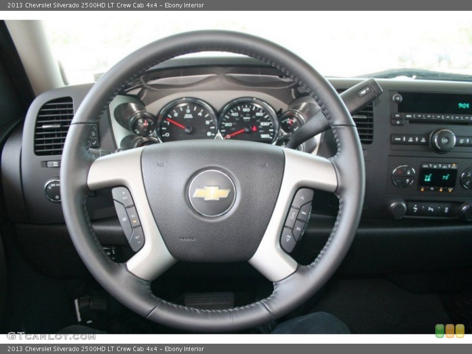 Ebony Interior Steering Wheel for the 2013 Chevrolet Silverado 2500HD LT Crew Cab 4x4 #70139201