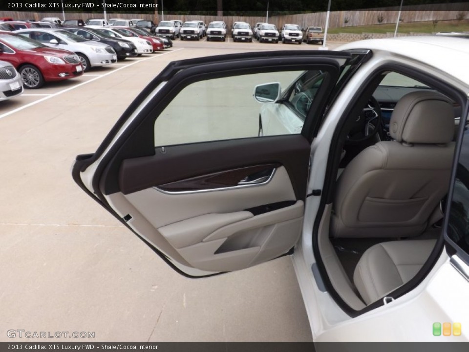 Shale/Cocoa Interior Door Panel for the 2013 Cadillac XTS Luxury FWD #70146779
