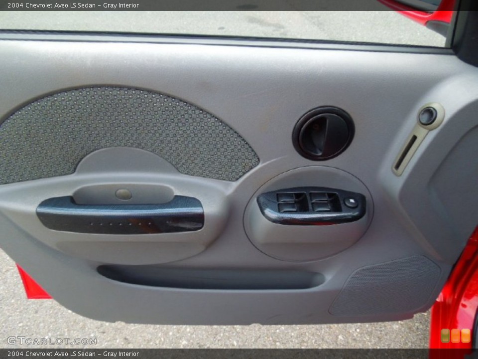 Gray Interior Door Panel for the 2004 Chevrolet Aveo LS Sedan #70191317