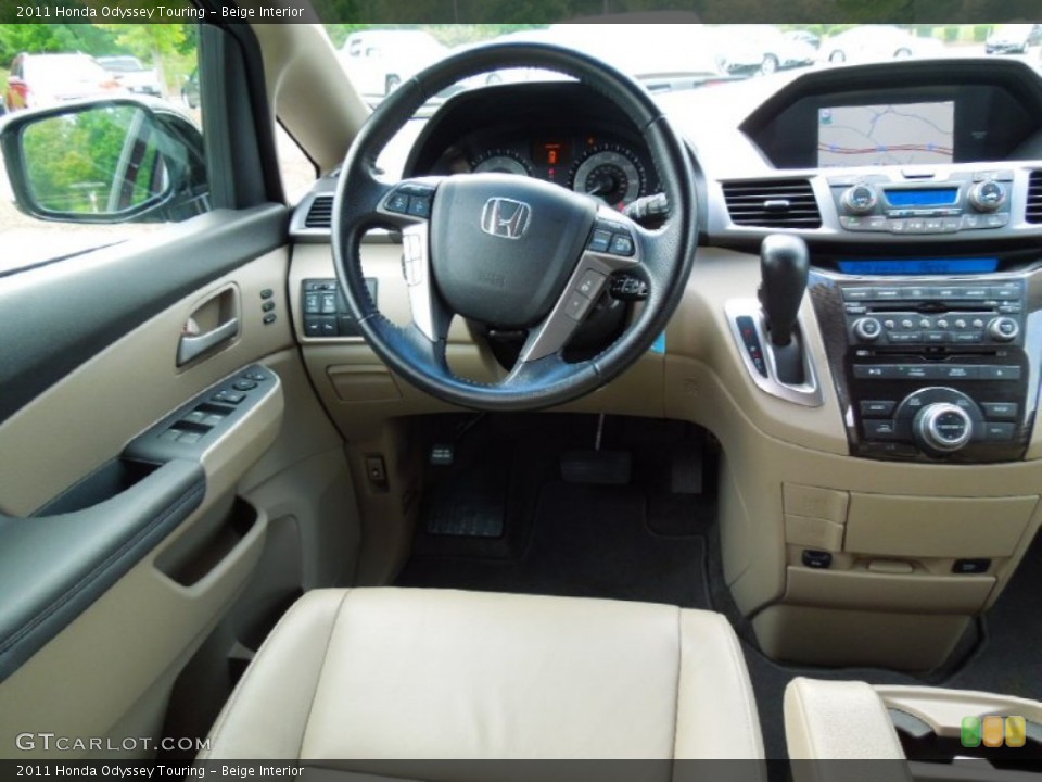 Beige Interior Dashboard for the 2011 Honda Odyssey Touring #70194047