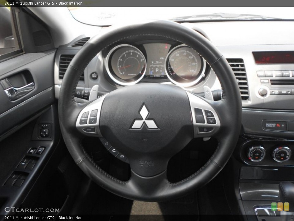 Black Interior Steering Wheel for the 2011 Mitsubishi Lancer GTS #70232933