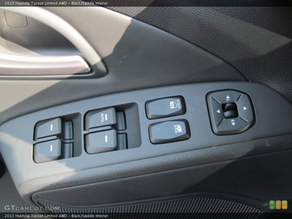 Black/Saddle Interior Controls for the 2013 Hyundai Tucson Limited AWD #70245433