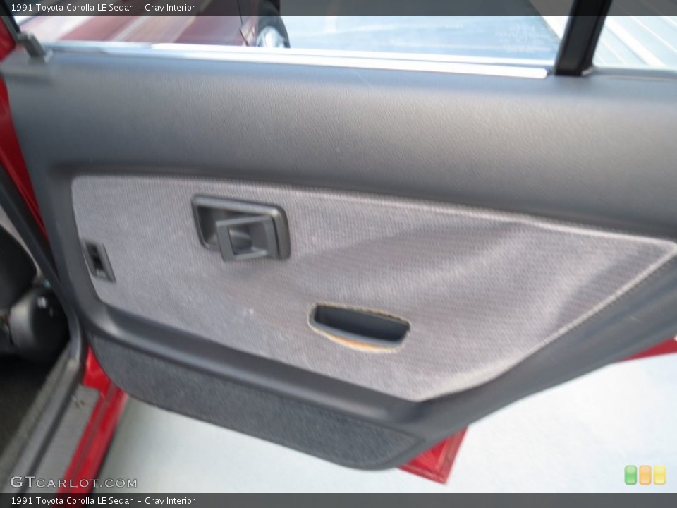 Gray Interior Door Panel for the 1991 Toyota Corolla LE Sedan #70249486