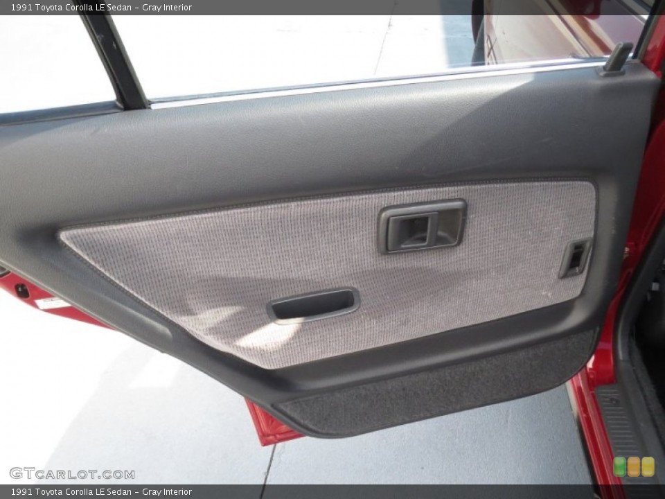 Gray Interior Door Panel for the 1991 Toyota Corolla LE Sedan #70249498