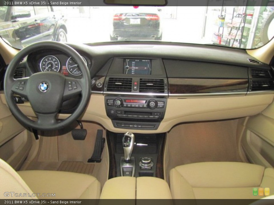Sand Beige Interior Dashboard for the 2011 BMW X5 xDrive 35i #70252117