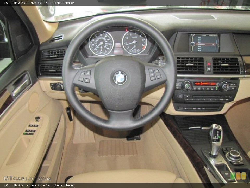 Sand Beige Interior Dashboard for the 2011 BMW X5 xDrive 35i #70252252