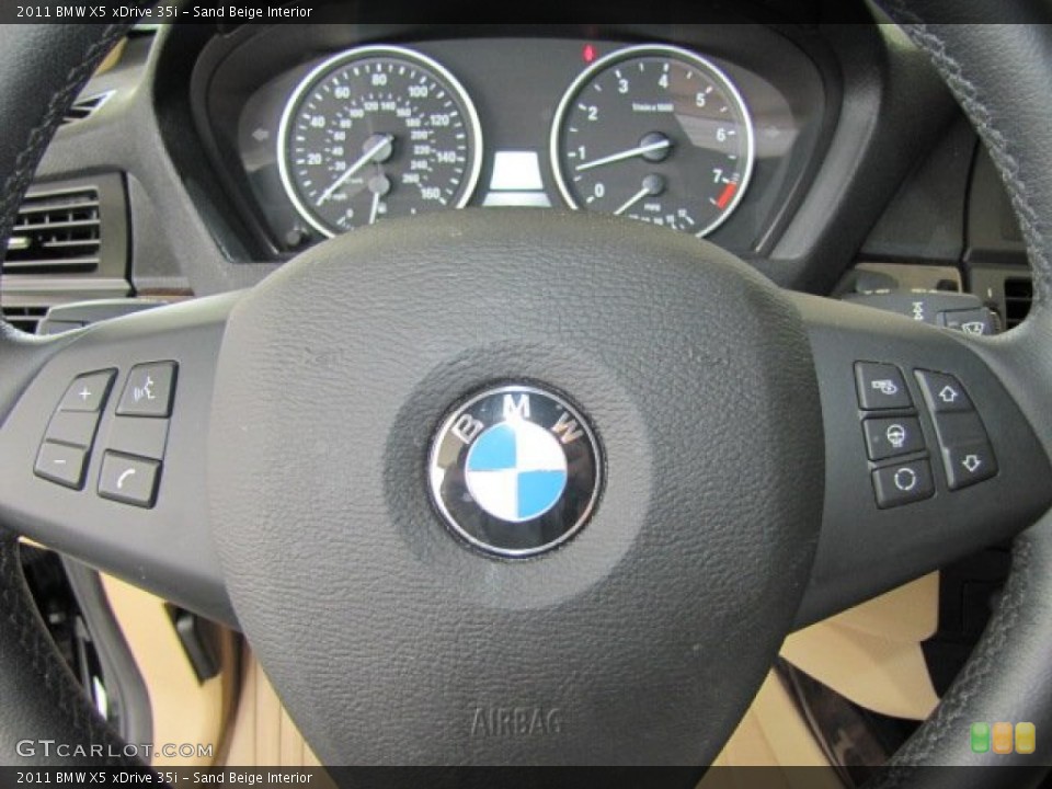 Sand Beige Interior Controls for the 2011 BMW X5 xDrive 35i #70252274