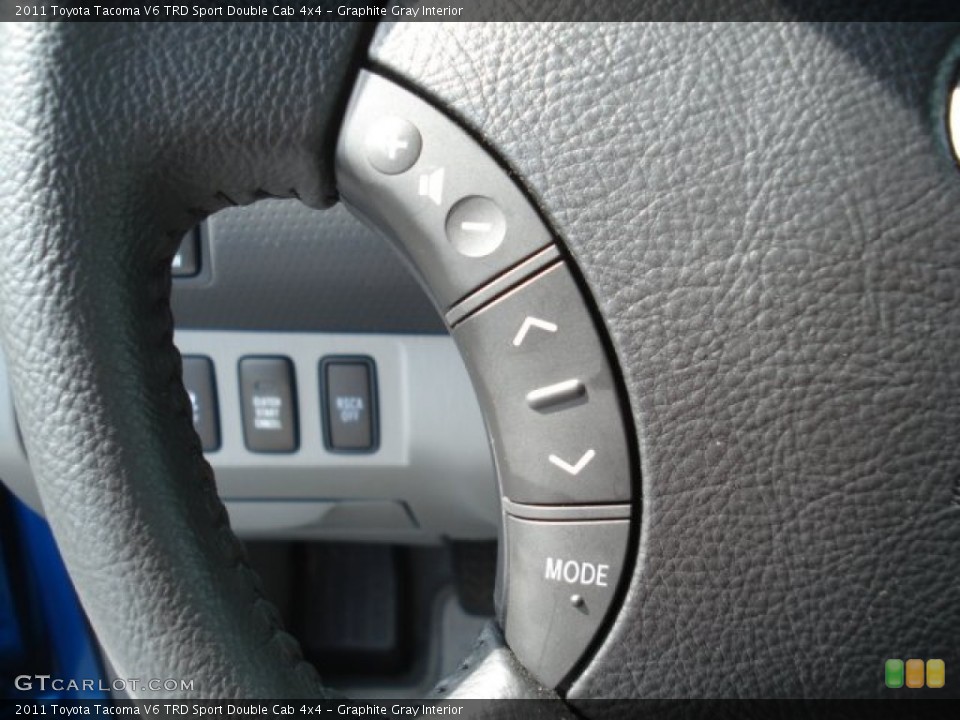 Graphite Gray Interior Controls for the 2011 Toyota Tacoma V6 TRD Sport Double Cab 4x4 #70313280