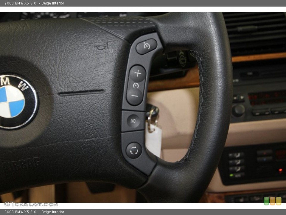Beige Interior Controls for the 2003 BMW X5 3.0i #70319940