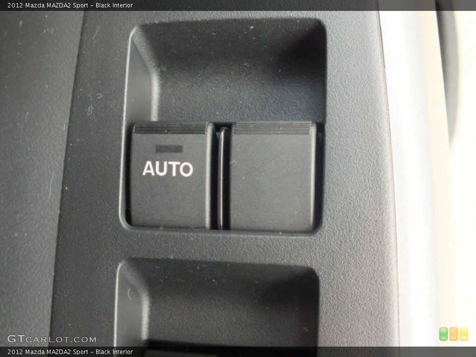 Black Interior Controls for the 2012 Mazda MAZDA2 Sport #70320045