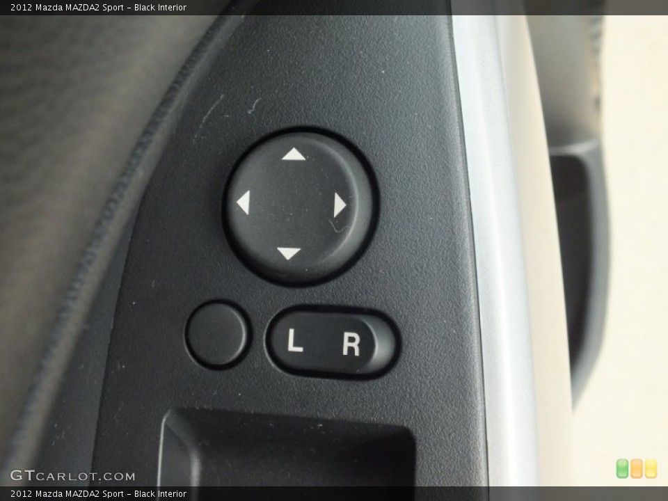 Black Interior Controls for the 2012 Mazda MAZDA2 Sport #70320054