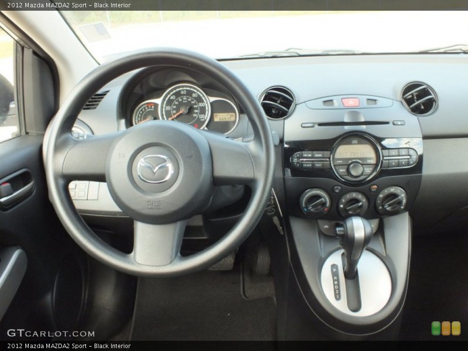 Black Interior Dashboard for the 2012 Mazda MAZDA2 Sport #70320129
