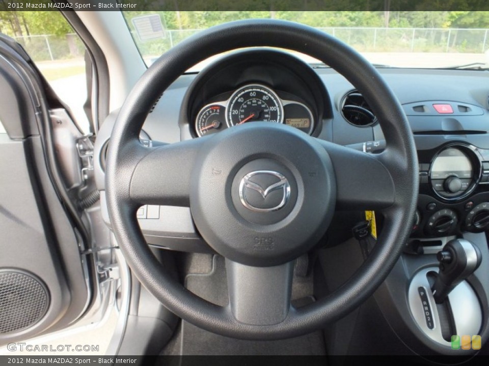 Black Interior Steering Wheel for the 2012 Mazda MAZDA2 Sport #70320138