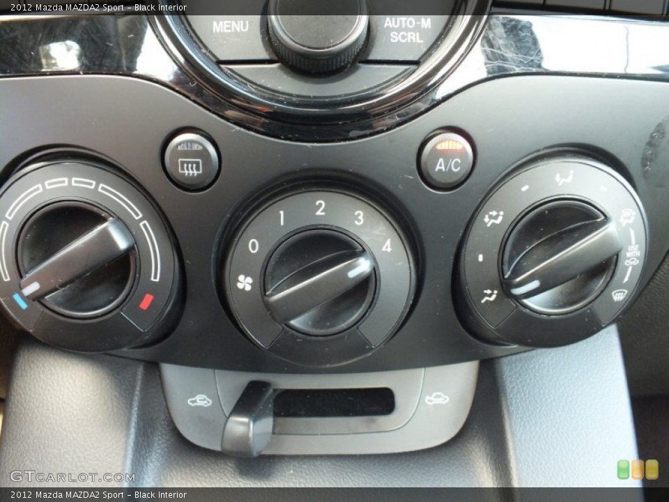Black Interior Controls for the 2012 Mazda MAZDA2 Sport #70320198