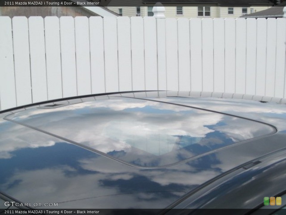 Black Interior Sunroof for the 2011 Mazda MAZDA3 i Touring 4 Door #70324092