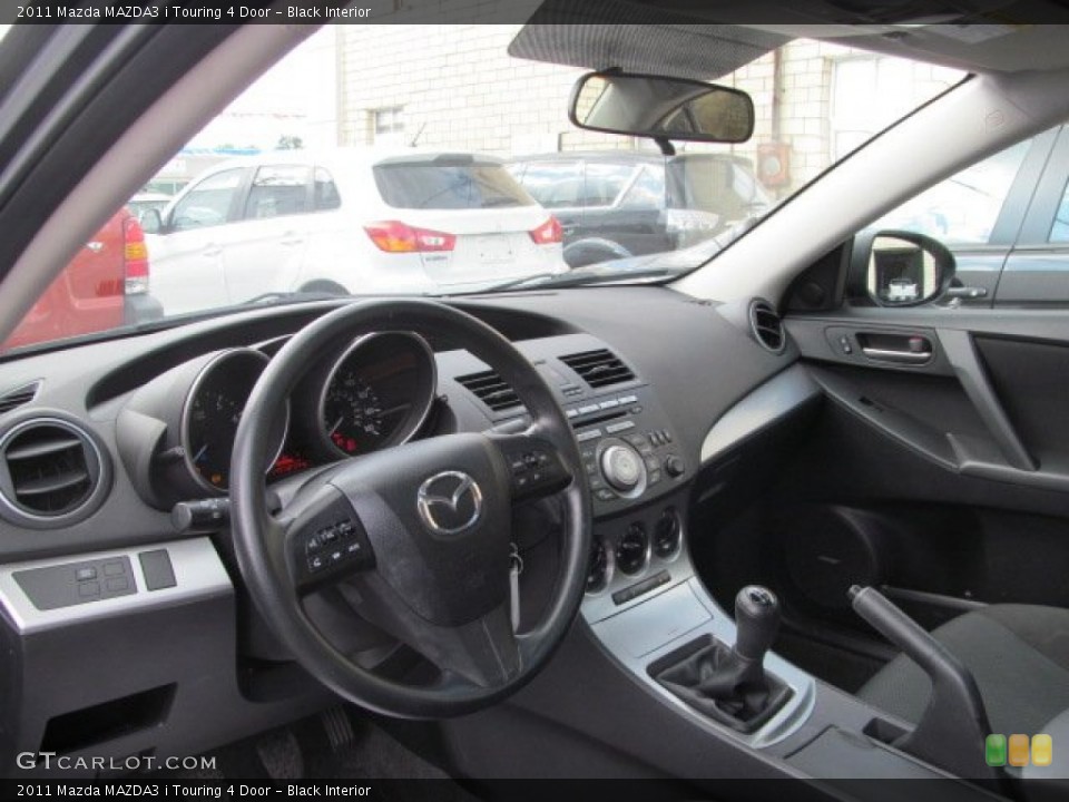 Black Interior Dashboard for the 2011 Mazda MAZDA3 i Touring 4 Door #70324152