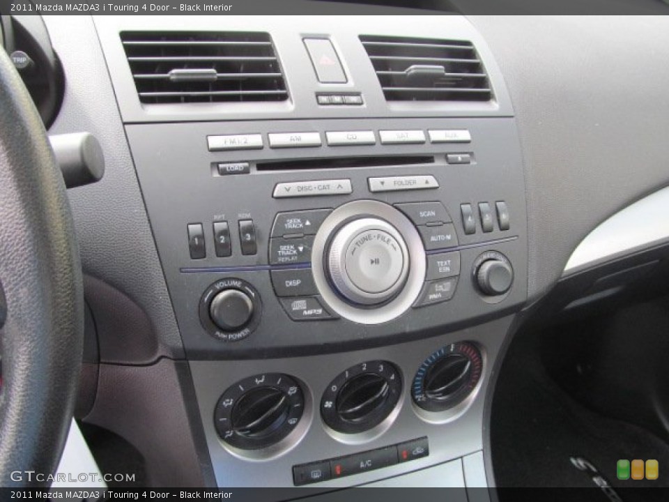 Black Interior Controls for the 2011 Mazda MAZDA3 i Touring 4 Door #70324164
