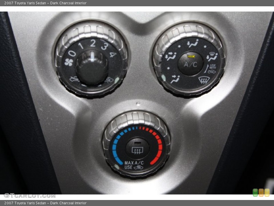Dark Charcoal Interior Controls for the 2007 Toyota Yaris Sedan #70325043