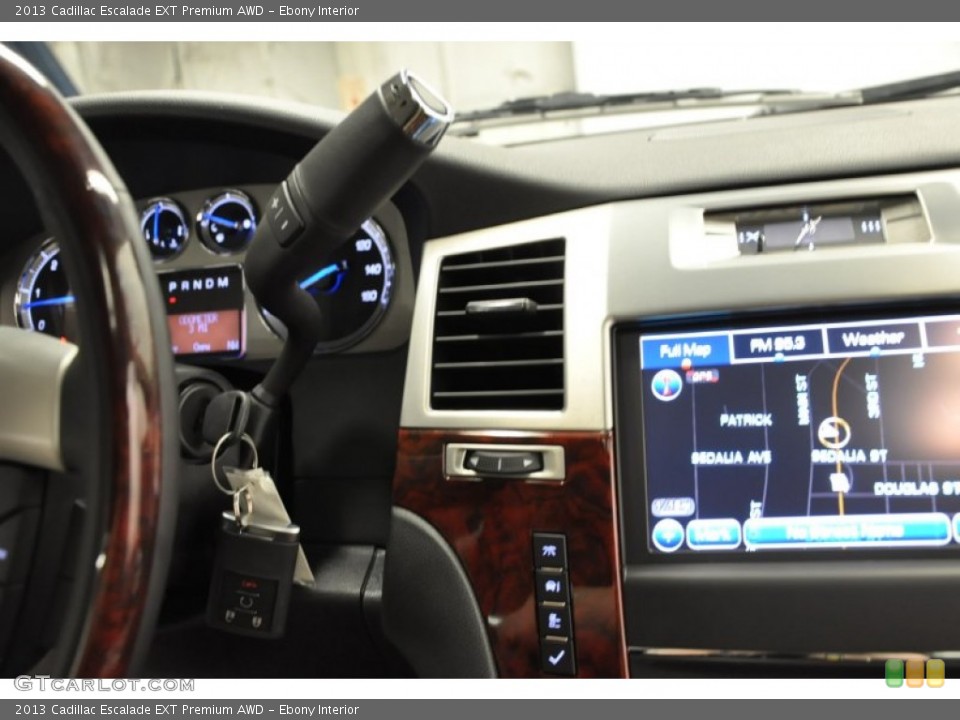 Ebony Interior Controls for the 2013 Cadillac Escalade EXT Premium AWD #70330529