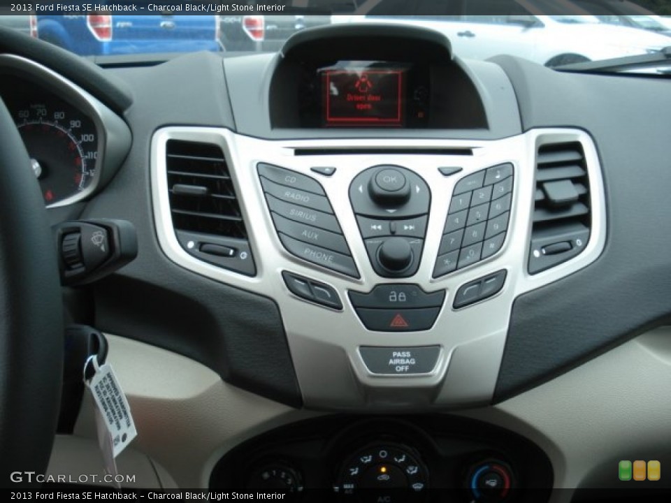 Charcoal Black/Light Stone Interior Controls for the 2013 Ford Fiesta SE Hatchback #70331679