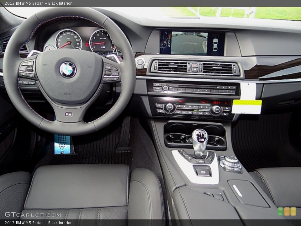Black Interior Dashboard for the 2013 BMW M5 Sedan #70332876