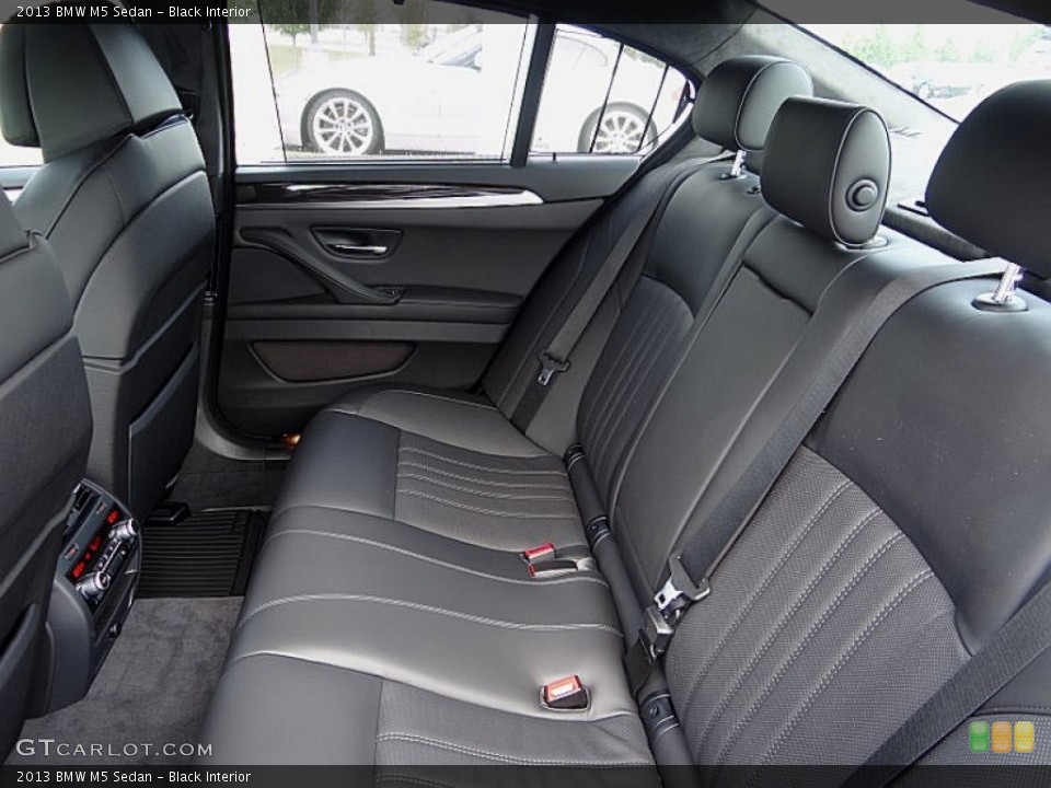 Black Interior Rear Seat for the 2013 BMW M5 Sedan #70332918