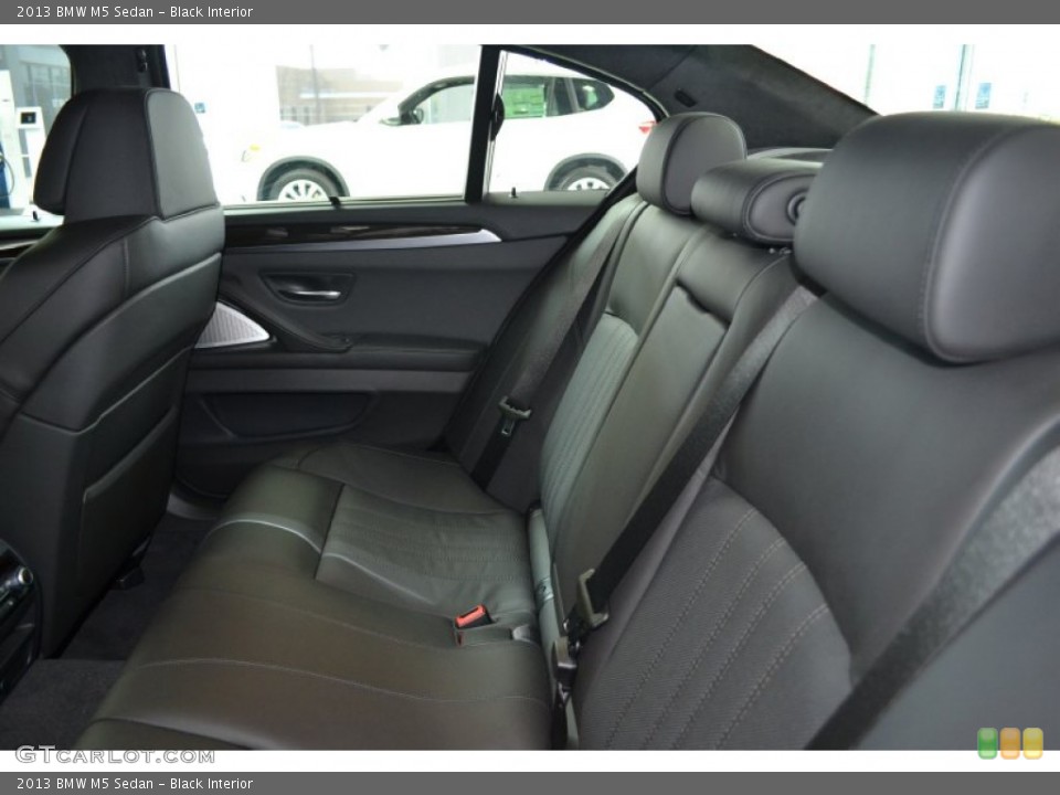 Black Interior Rear Seat for the 2013 BMW M5 Sedan #70337931