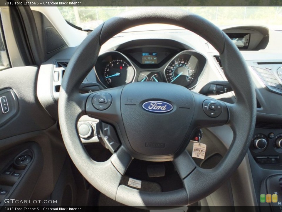 Charcoal Black Interior Steering Wheel for the 2013 Ford Escape S #70365129