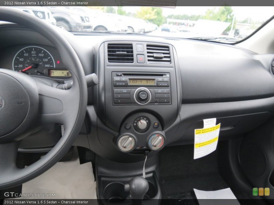 Charcoal Interior Dashboard for the 2012 Nissan Versa 1.6 S Sedan #70445911