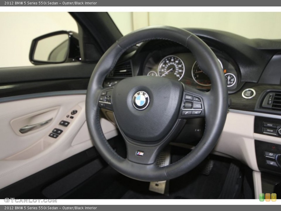 Oyster/Black Interior Steering Wheel for the 2012 BMW 5 Series 550i Sedan #70495460
