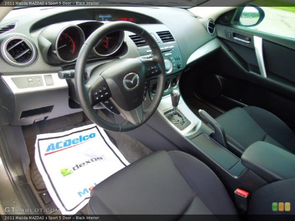 Black Interior Prime Interior for the 2011 Mazda MAZDA3 s Sport 5 Door #70539240