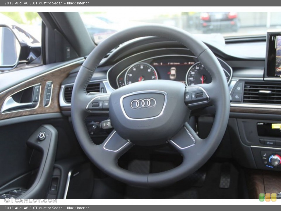 Black Interior Steering Wheel for the 2013 Audi A6 3.0T quattro Sedan #70630554