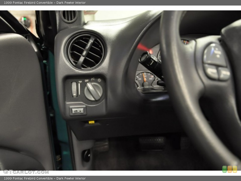 Dark Pewter Interior Controls for the 1999 Pontiac Firebird Convertible #70633623