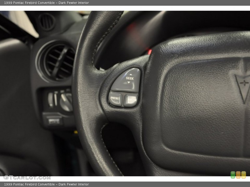 Dark Pewter Interior Controls for the 1999 Pontiac Firebird Convertible #70633639