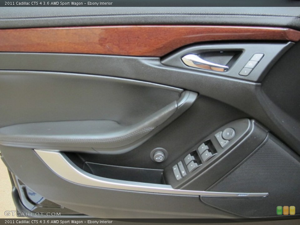 Ebony Interior Door Panel for the 2011 Cadillac CTS 4 3.6 AWD Sport Wagon #70728422