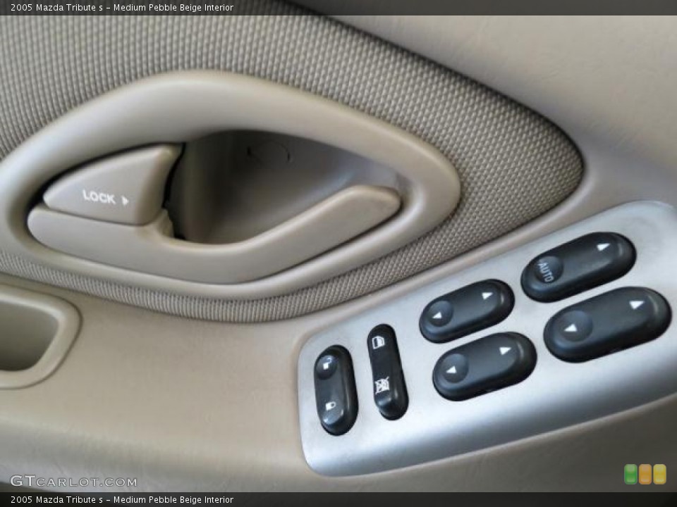 Medium Pebble Beige Interior Controls for the 2005 Mazda Tribute s #70771943