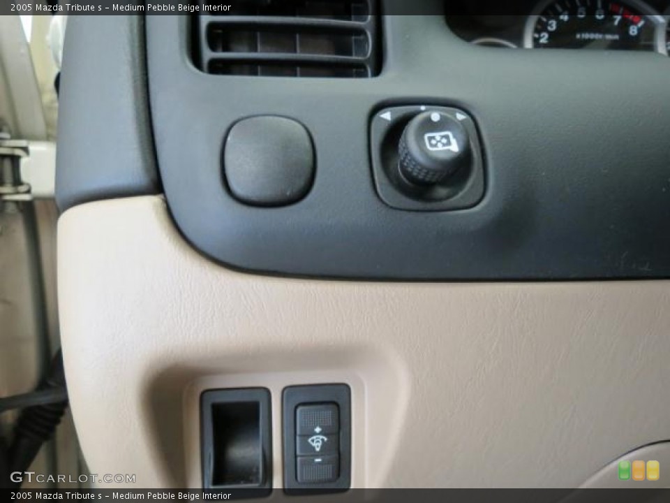 Medium Pebble Beige Interior Controls for the 2005 Mazda Tribute s #70772024