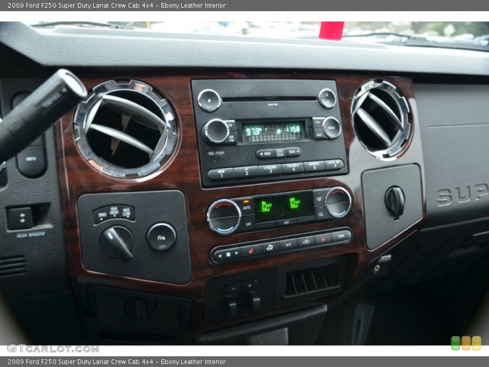 Ebony Leather Interior Controls for the 2009 Ford F250 Super Duty Lariat Crew Cab 4x4 #70779086