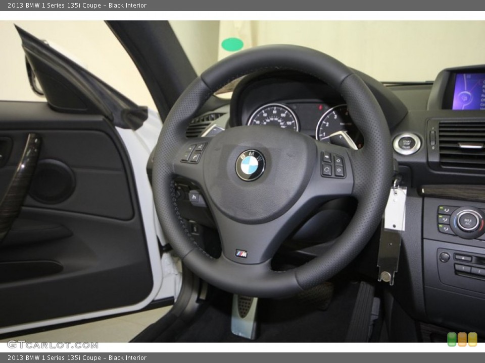 Black Interior Steering Wheel for the 2013 BMW 1 Series 135i Coupe #70782869