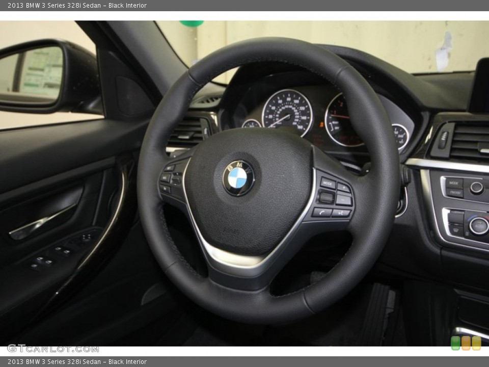Black Interior Steering Wheel for the 2013 BMW 3 Series 328i Sedan #70783562