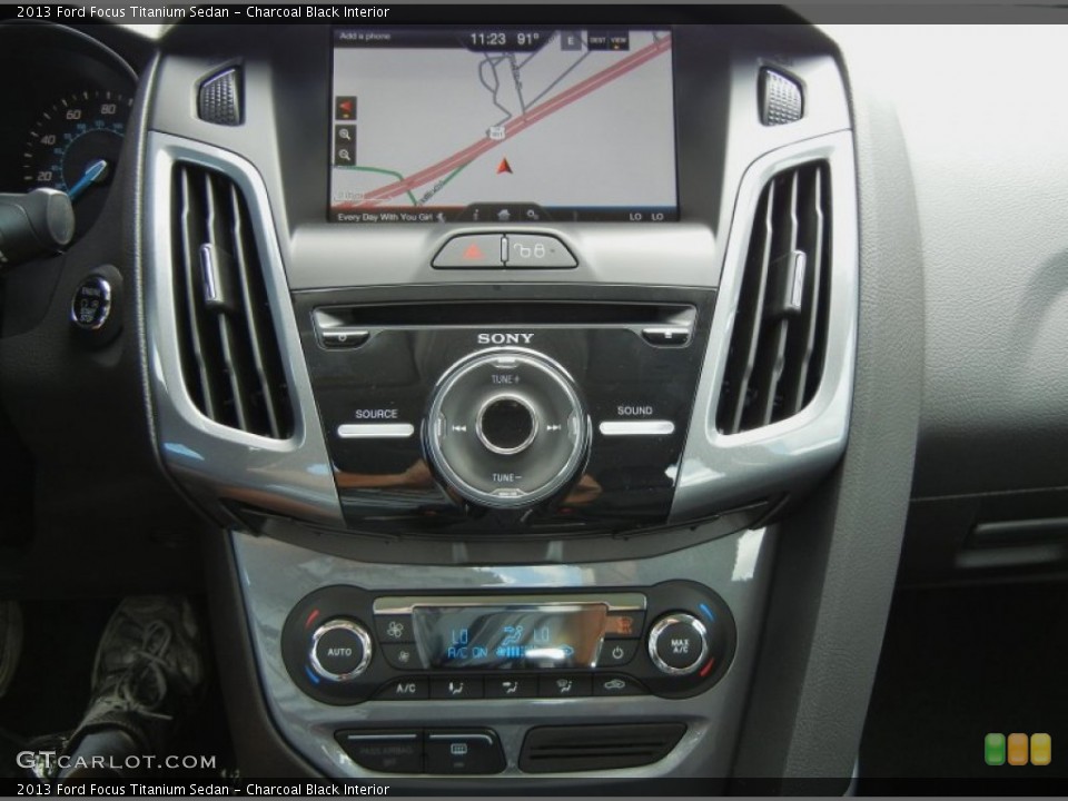 Charcoal Black Interior Controls for the 2013 Ford Focus Titanium Sedan #70787777