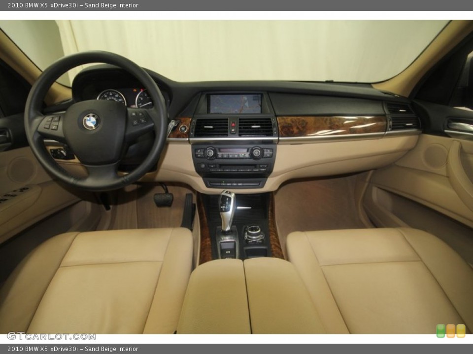 Sand Beige Interior Dashboard for the 2010 BMW X5 xDrive30i #70848304